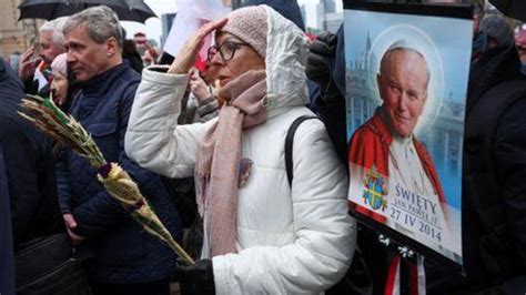 Poles march to defend Pope John Paul II against abuse cover-up allegations
